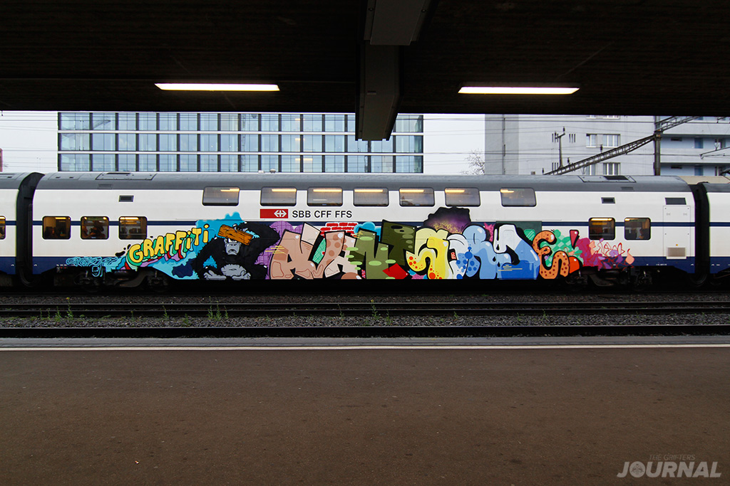 graffiti-avnat-garde-moses-taps-topsprayer-switzerland-comuter-train-the-grifters-journal
